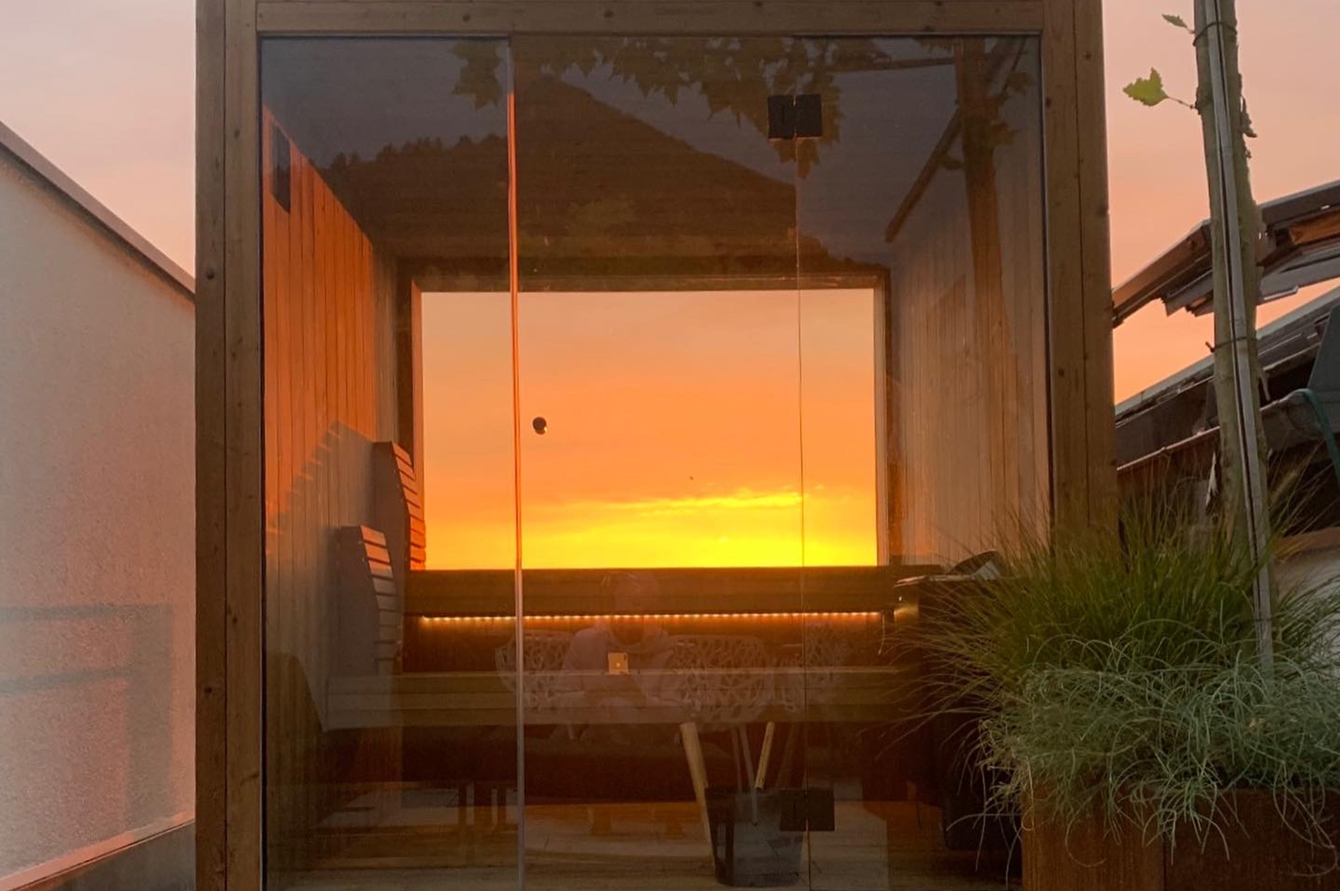 Thermalux outdoor sauna with view of the sunset