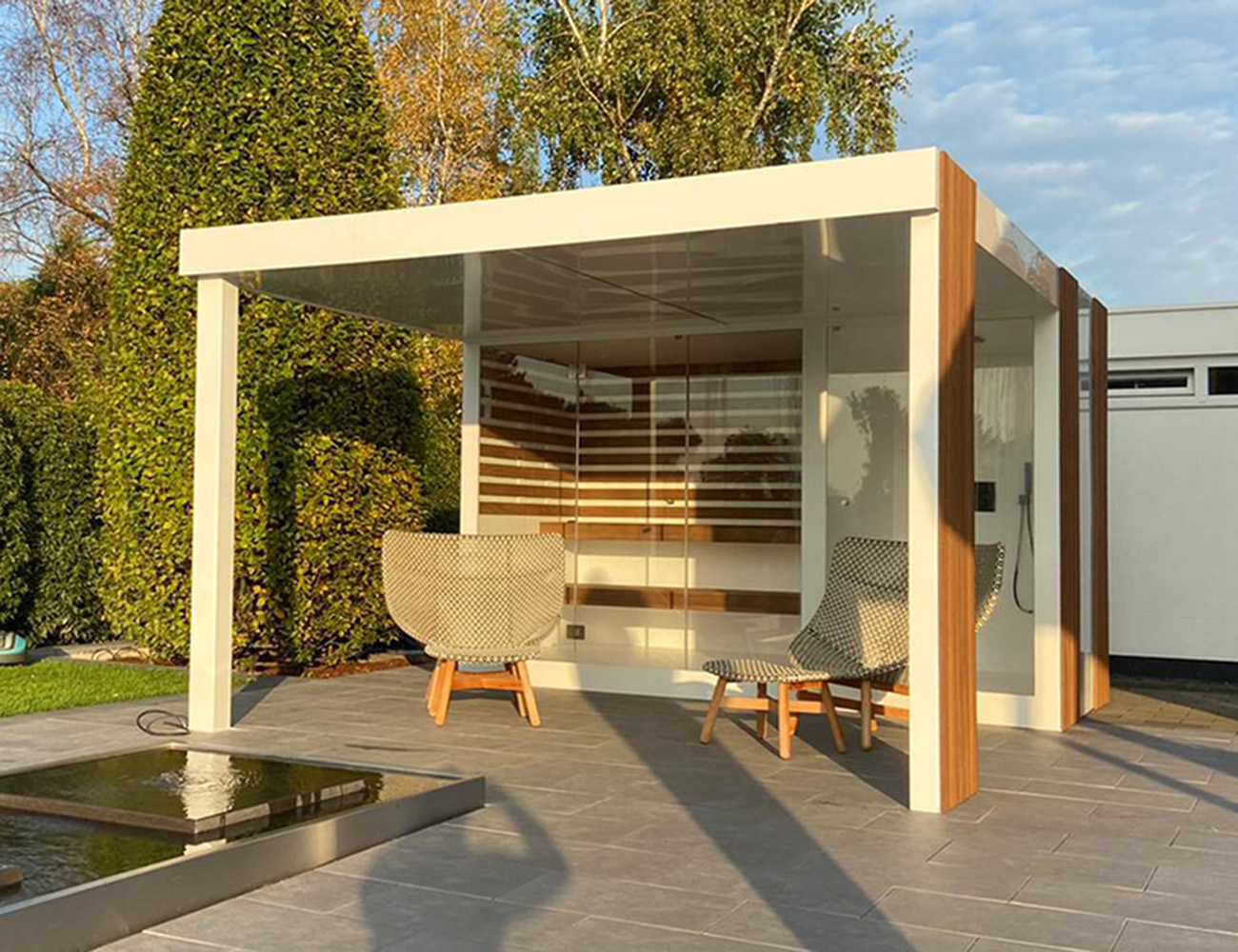 Outdoor sauna and shower room with terrace roof